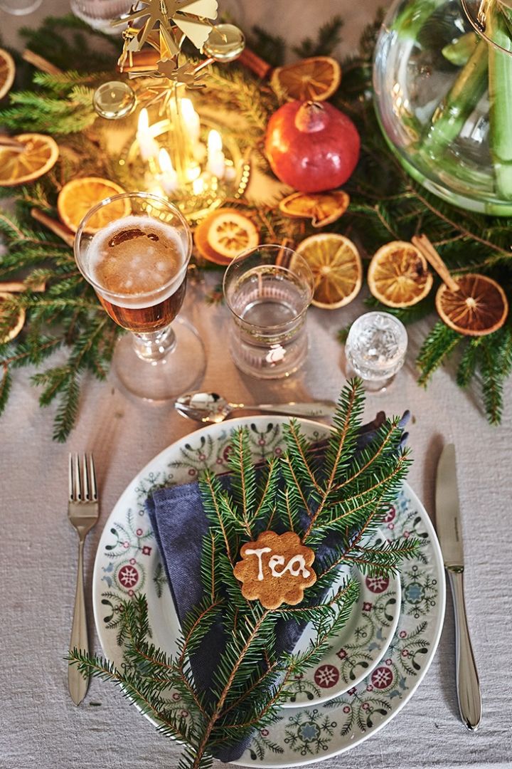 A traditional Christmas table setting with the Swedish Grace Winter collection.