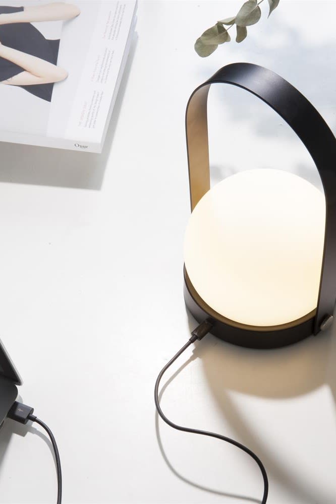 Cordless lighting is the perfect solution for any small home office as it allows you to move the lamp wherever you need it most. The cordless carrie lamp from Audo Copenhagen is perfect. 
