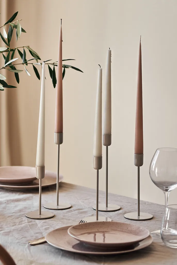 Beige Arctic candlesticks in different sizes on table setting with beige Freckle plates - two of our 7 beige interior design favourites this autumn. 