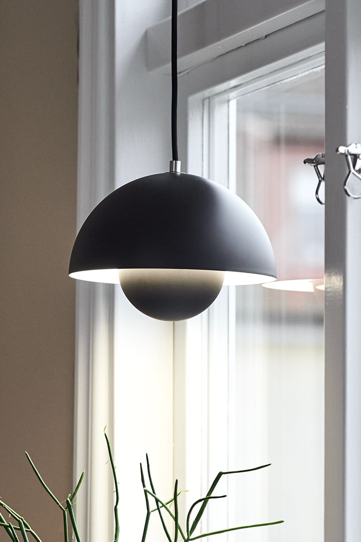 Here you see the Scandinavian design lamp the VP1 hanging in a window. 