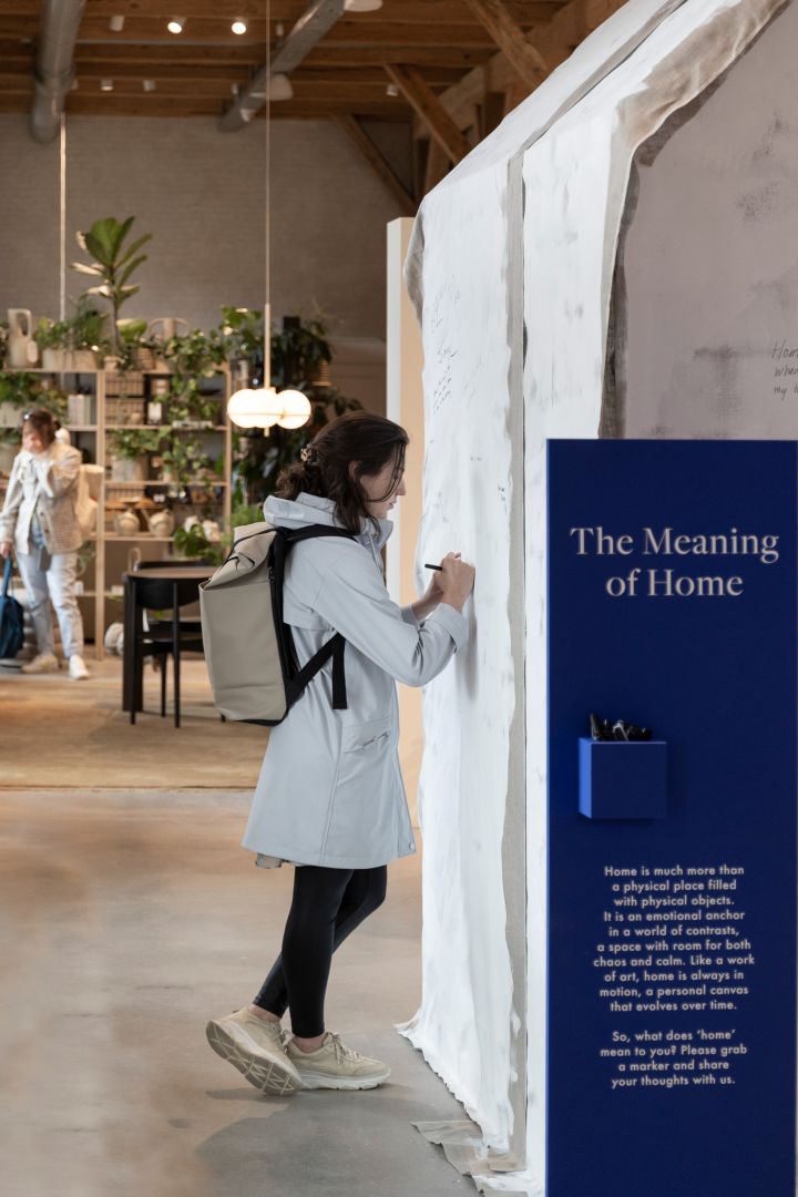 In Ferm Living´s showroom in Copenhagen in Denmark you can as a visitor write what the meaning of a home is to you on a small house.
