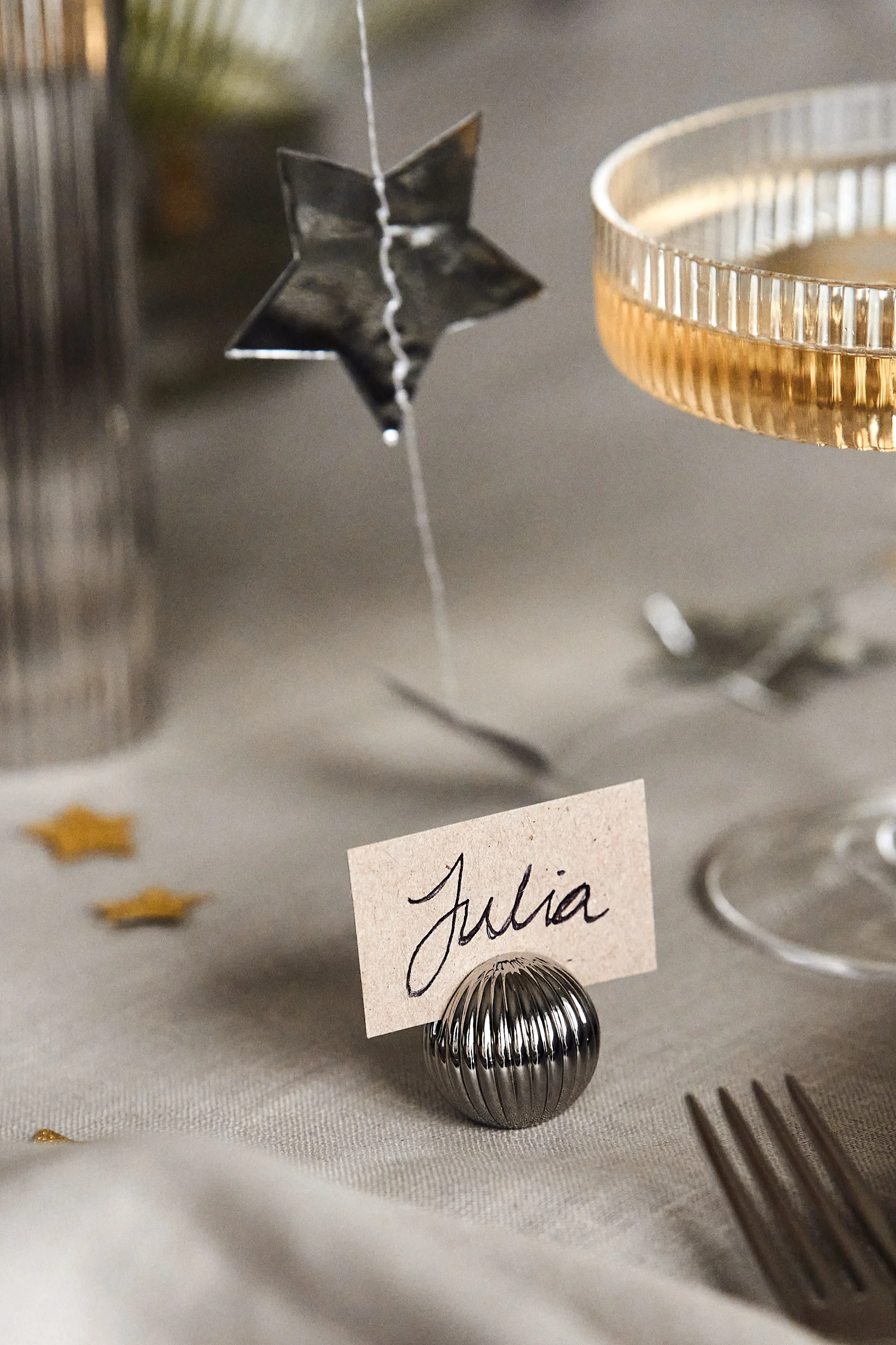 New year party ideas - use place card holders like this one from Georg Jensen to let your friends and family know where to sit this new year. 