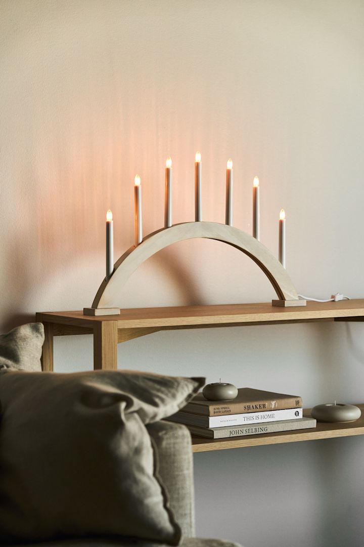 Minimalistic Christmas lighting from Scandi Living like the Sky Candle arch that you see here on a wooden side board. 