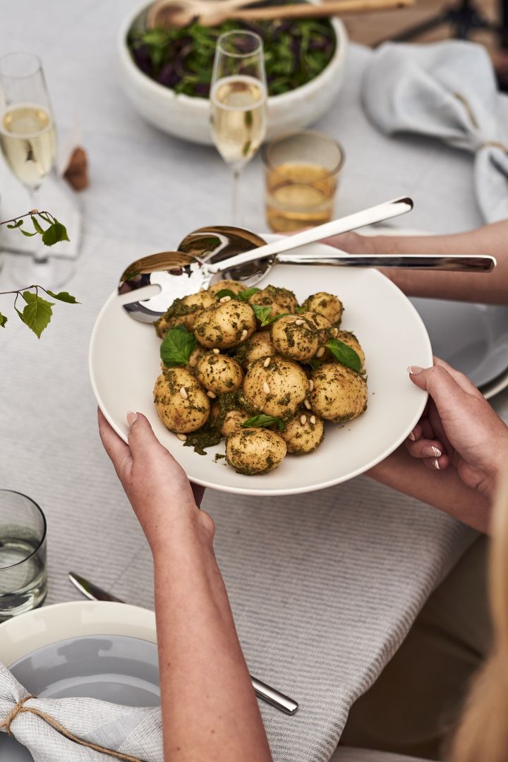 Serve a delicious pesto potato salad like this one at your next summer garden party.