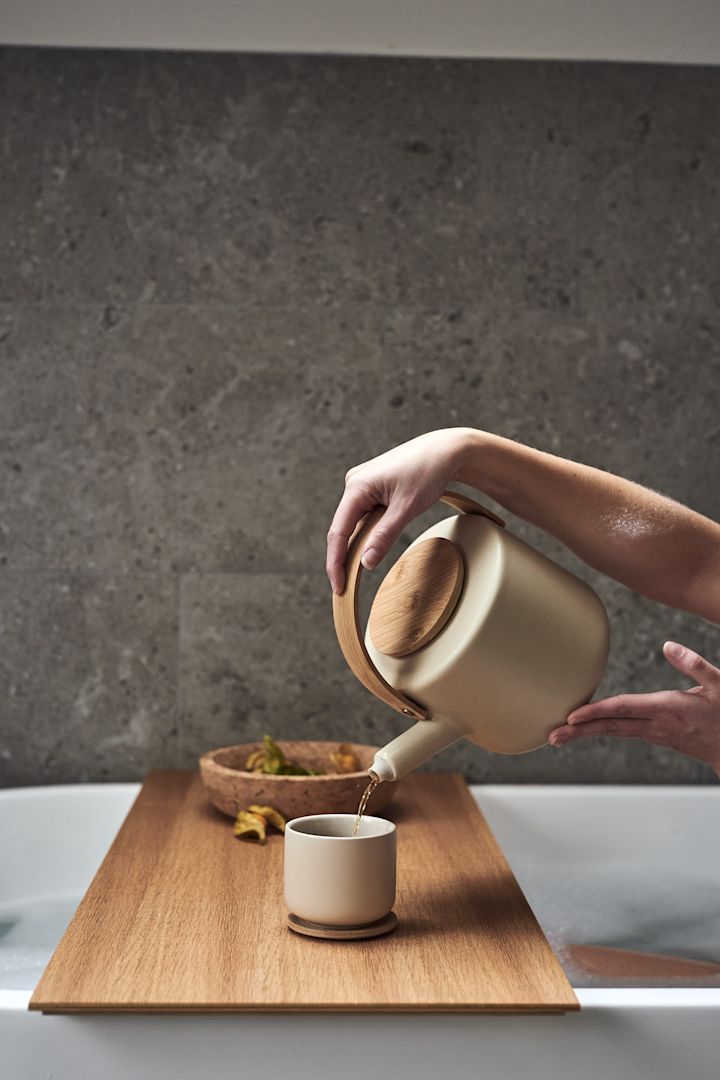 Spa decor ideas for your bathroom that help you create moments like this with the Theo teapot and matching mug from Stelton. 