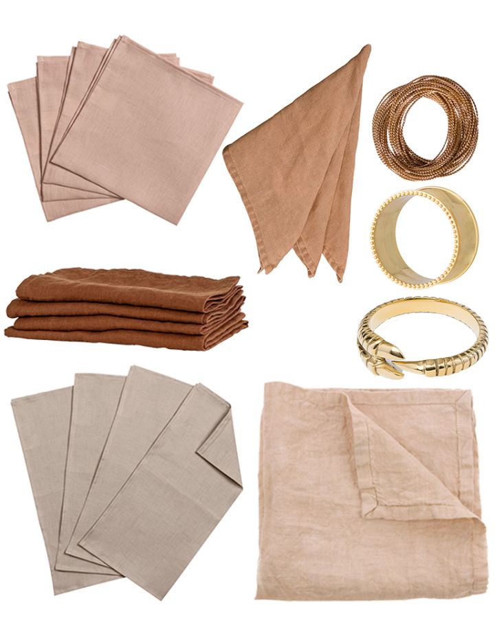 Napkin folding ideas - Linen napkins in pink, beige and brown together with napkin rings in brass or gold make a stylish combination if the New Year's table setting has a golden theme.