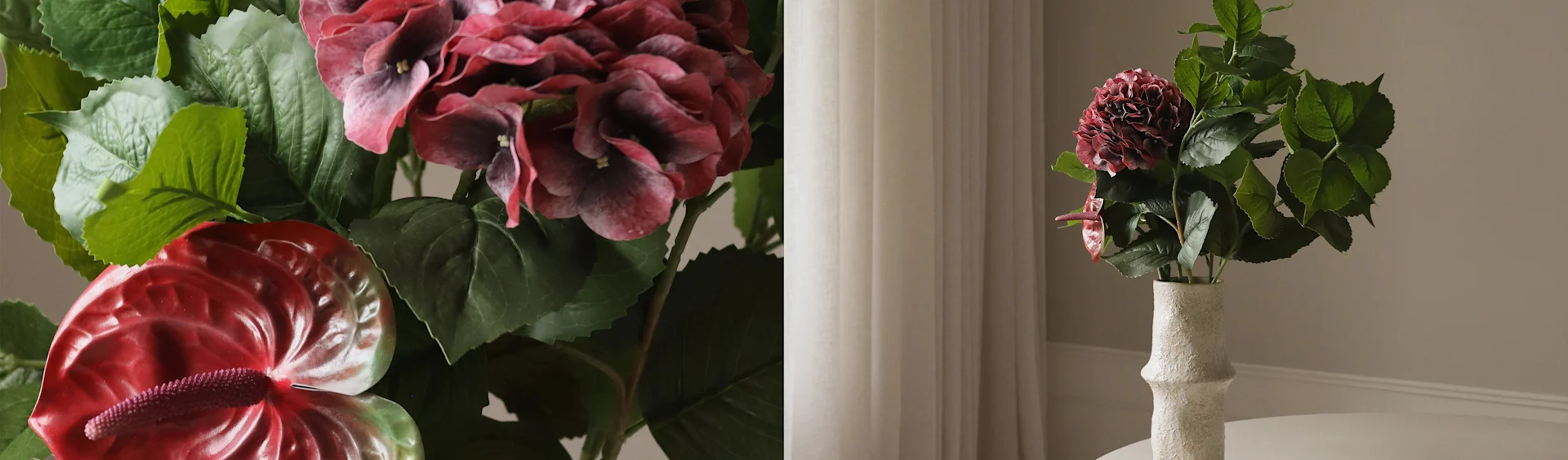 Artificial dark red hydrangea and red anthurium flowers in a textured white vase.