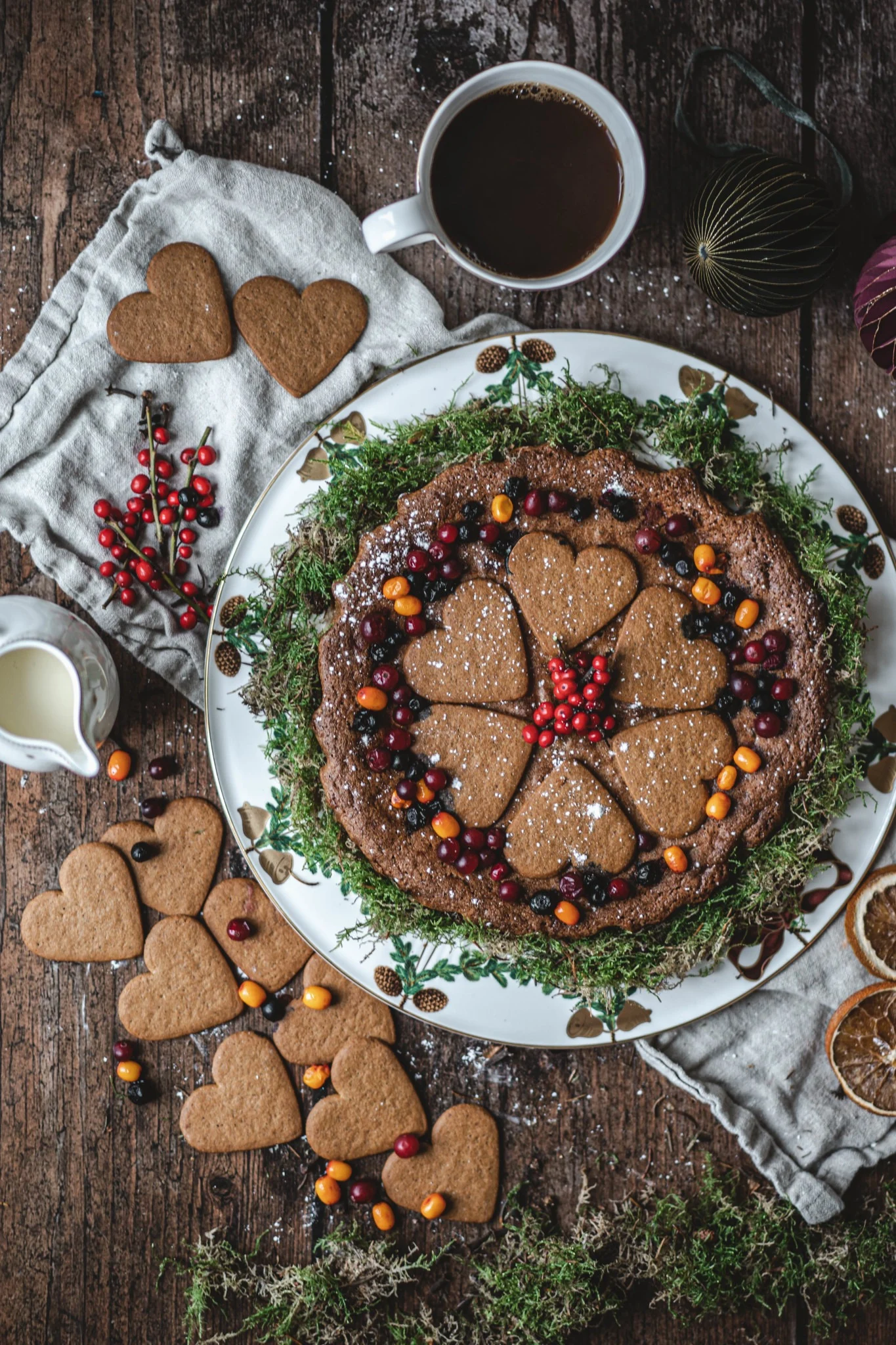 Traditional Swedish pastries are simply part of Christmas in Sweden. Here, a chocolate cake decorated with gingerbread stands on a table.
