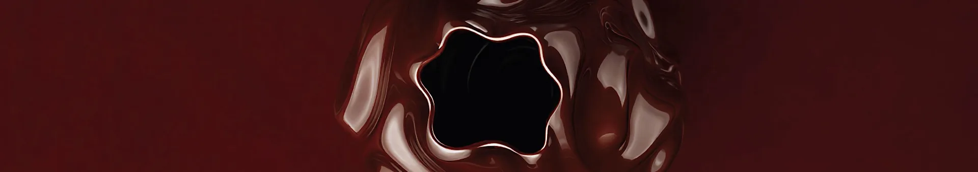 Glossy, dark red liquid with swirling reflections and a central, irregular black void.