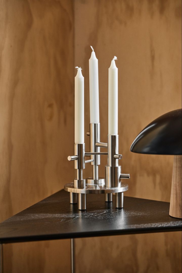Here you see the Jaime Hayon candle holder large in brushed steel for Fritz Hansen. 