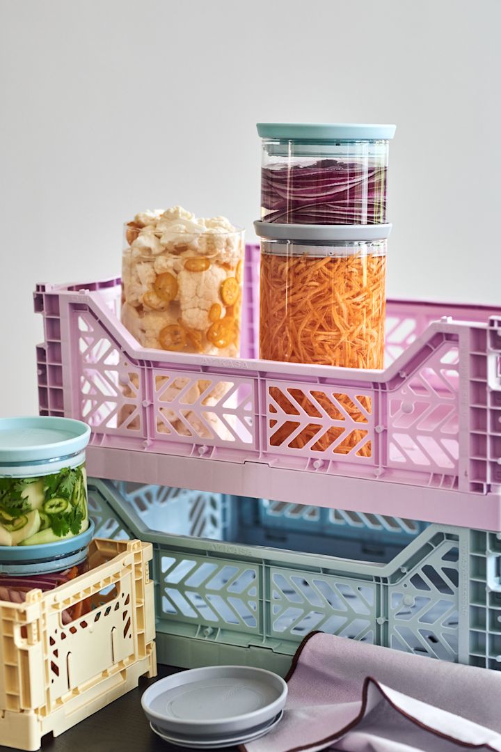 Our interior 2022 is playful and flirts with 80s pastels and pops of neon! Here are the fun and practical storage crates from HAY. 