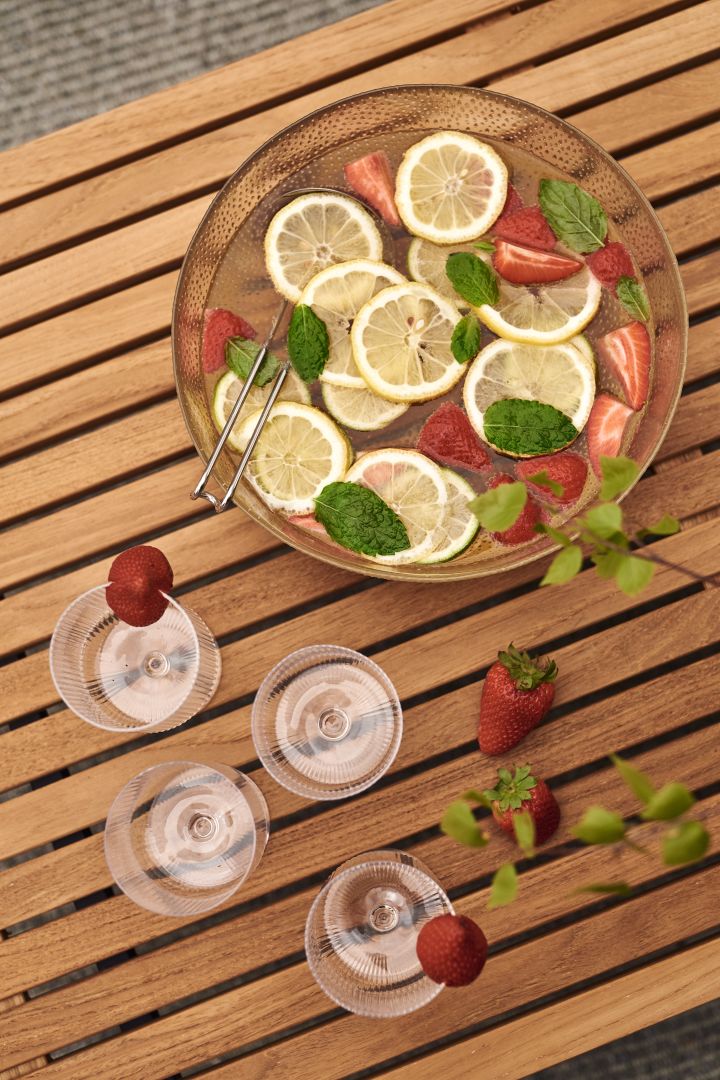 Serving a lovely bowl of bubbly summer punch along side your food for summer garden parties.