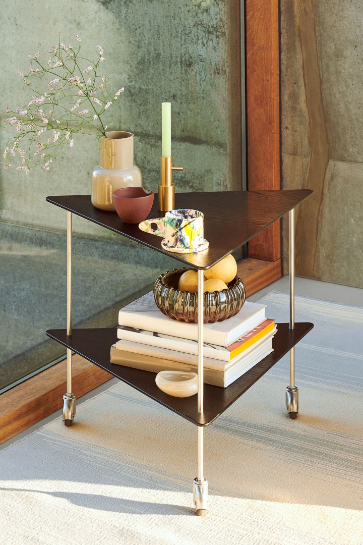 Jaime Hayon Single candle holder brass and AJ side table from Fritz Hansen. 