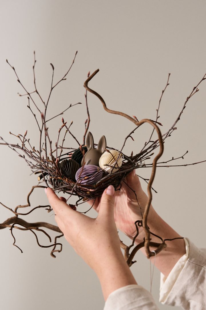 Create an Easter tree with a miniature birds nest in the branches. 