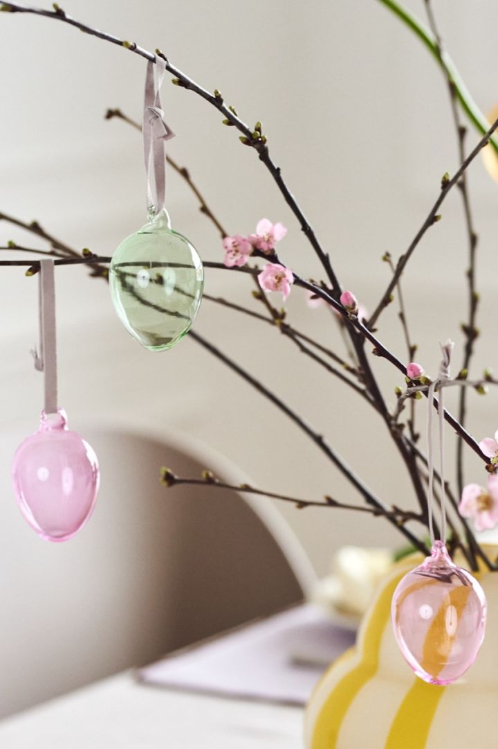 Create a bright and colourful Easter tree with the pastel colours hanging glass eggs from Iittala.