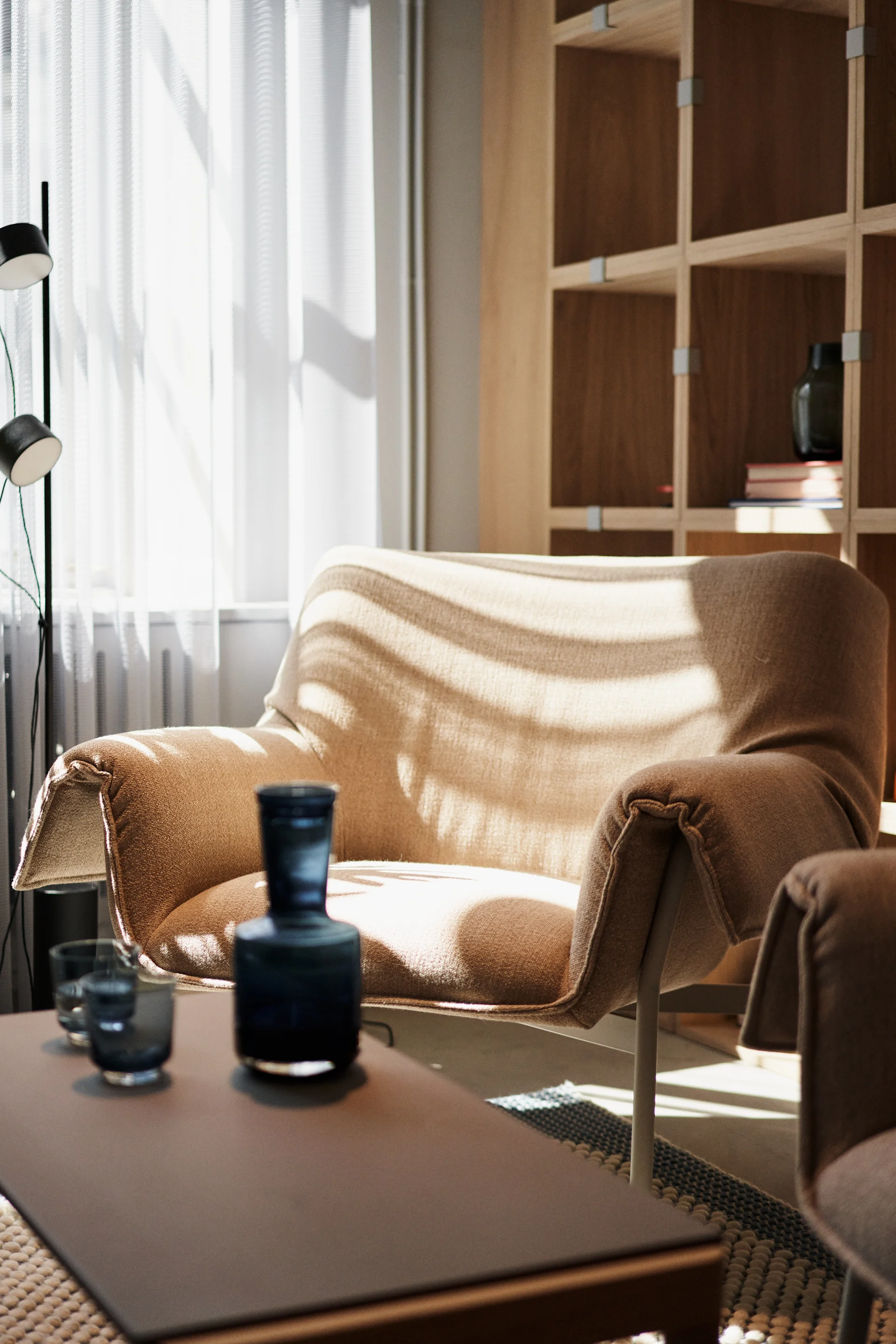 This year's Scandinavian interior design trends for 2024 include flowing designs like this armchair from Muuto where the armrests drape along the side of the chair.