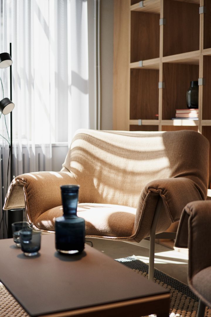 This year's Scandinavian interior design trends for 2024 include flowing designs like this armchair from Muuto where the armrests drape along the side of the chair.